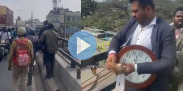 हा काय वेडेपणा! उड्डाणपुलावर उभा राहून करू लागला नोटांचा वर्षाव, Video झाला व्हायरल